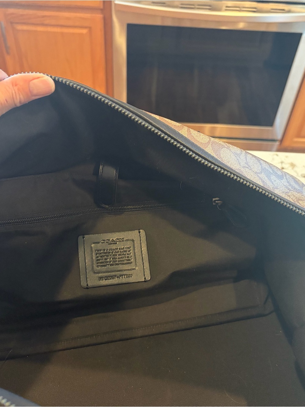 Coach Trekker 52” travel duffle. - Picture 8 of 9